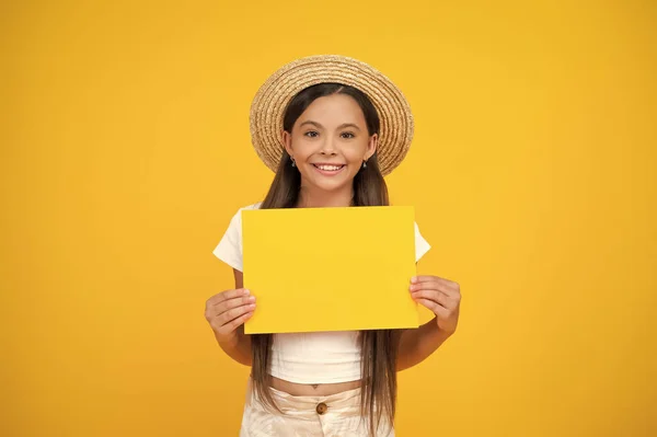Cheerful Teen Girl Hold Empty Advertisement Paper Copy Space Yellow — Foto de Stock