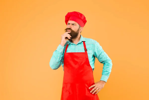 time for lunch. thinking bearded chef. male cook in hat and apron. professional man cooking. restaurant cuisine and culinary. catering business company. welcome to our cafe. Flavorful occasions.
