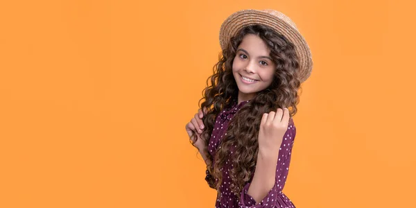 Smiling Kid Straw Hat Long Brunette Curly Hair Yellow Background — стоковое фото