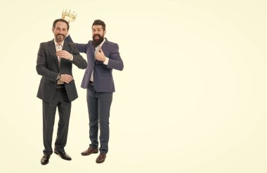 Champion always first. Bearded man reward champion with crown. Crowned champion. Champion tittle. Ambitious winner. Victory and success. Fame and glory. King of business. Born to win.