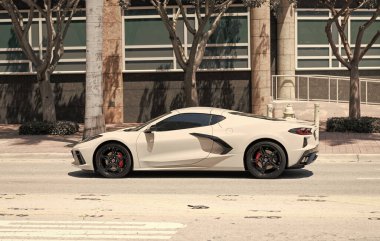 Miami Beach, Florida USA - April 15, 2021: white chevrolet corvette sportcar, side view.
