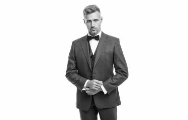 Papyonlu, mavi takım elbiseli olgun bir adam. Beyaz iş adamı. Takım elbise lideri..