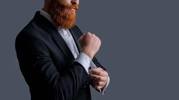 cropped view of bearded man in tuxedo isolated on grey background, copy space. man studio shot in tuxedo. man wearing elegant tuxedo. tuxedo fashion.