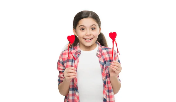 Live with no regrets, love with no limits. Small girl holding hearts on sticks. Cute girl with red hearts. Child hold heart decorations. Happy valentines day. Family love concept. Love is about trust.