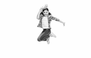 childhood of girl in crown in studio. childhood of girl in crown on background. photo of girl in crown, childhood concept. childhood of girl in crown jump isolated on white.