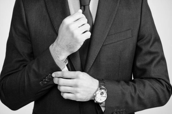 cropped boss in formal suit and wrist watch.