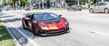Miami Beach, Florida USA - April 15, 2021: brown Lamborghini Aventador LP 750-4 SV, front view.