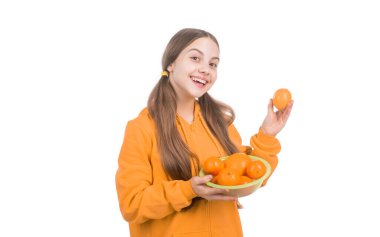 Güzel gülümseme. sağlıklı bir hayat. diyet ve cilt güzelliği. Turunçgil meyveli mutlu genç kız. Vitamin ve diyet. Çocuk sağlıklı yiyecekler yiyor. Çocukluk sağlığı. Turunçgiller. Doğal organik ve taze.