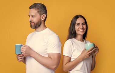 Happy couple enjoying coffee in morning. Couple of man and woman drinking morning coffee. Morning drink. Good morning.