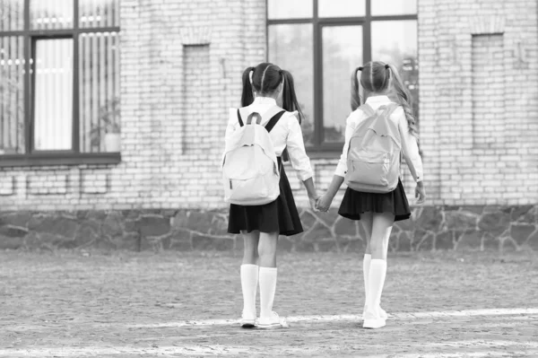 Back View Two Students School Backpack Walking Together Outdoor — Φωτογραφία Αρχείου