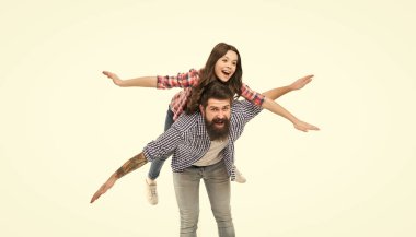 Imagination can get you everywhere. Happy family imagine flying. Imaginary sky travel. Father and daughter. Photo studio. Imagination and creativity. Imagination and dream. Happiness is imagination.