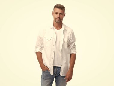 studio shot of adult grizzled man. mature grizzled man isolated on white background. grizzled man in white shirt. grizzled man style.