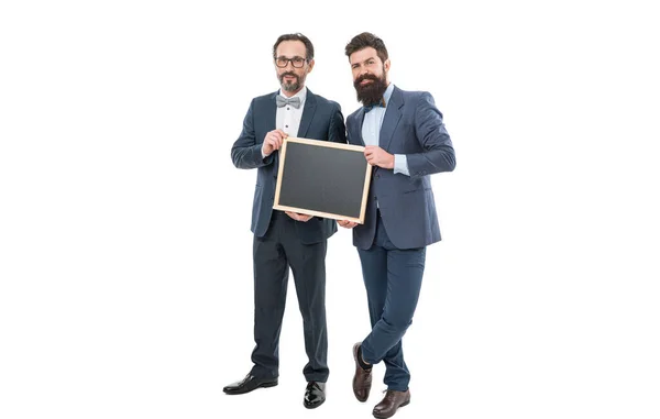 Sales report. bearded men hold advertisement blackboard. businessmen in suit, copy space. announcement. party invitation. partners celebrate start up business isolated on white. welcome on board.
