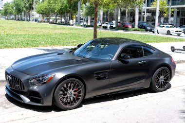 Miami Beach, Florida USA - April 15, 2021: matte mercedes benz v8 biturbo, side corner view.