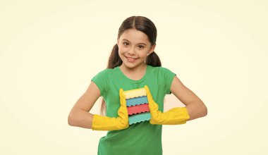 For sparkling results. Cleaning with sponge. Cleaning supplies. Girl wear protective gloves for cleaning hold sponges white background. Housekeeping duties. Household concept. Helpful daughter.