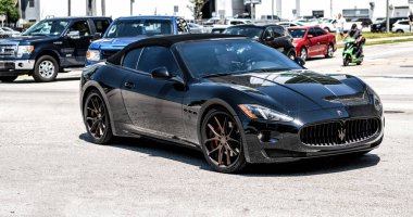 Miami Beach, Florida USA - April 15, 2021: black maserati gran turismo, corner view.