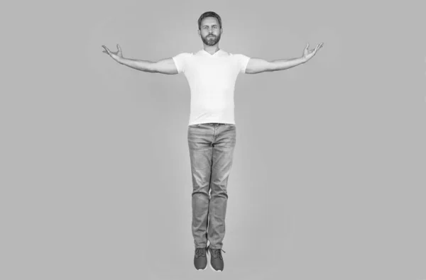 Handsome Man Levitating Yellow Studio Background Grizzled Guy Levitating Midair — Stock Fotó