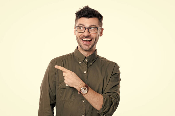 caucasian entrepreneur man point finger. portrait of entrepreneur man isolated on white background. entrepreneur man portrait in studio. entrepreneur man in glasses.