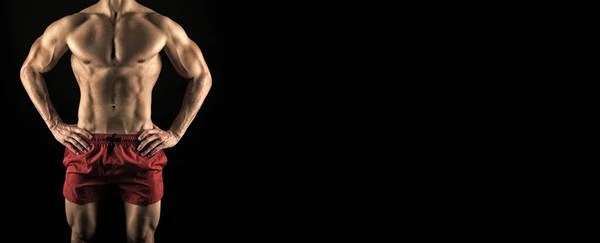 健美男子腹肌的剪影 健美男子的肌肉腹肌 以黑色背景隔离 演播室拍摄肌肉腹肌 运动和健身 肌肉男腹肌 复制空间 — 图库照片