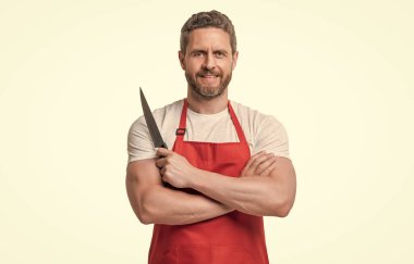 man in red apron hold knife isolated on white background.