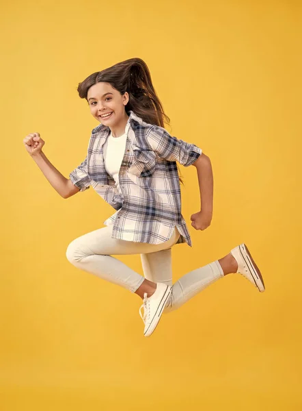 Photo Teen Girl Jump Wearing Checkered Shirt Teen Girl Isolated — Zdjęcie stockowe