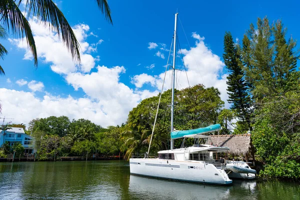 stock image Luxury yacht sailing on the Mediterranean sea, copy space. Private yacht sailing in waters of miami. Yacht sailing towards a beautiful coastline in sea. Yacht moored in a picturesque harbor.