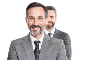 Takım elbiseli, seçici odaklı beyaz iş adamı. Yetişkin bir iş adamı beyaz arka planda izole edilmiş. Stüdyoda takım elbiseli bir iş adamı. Profesyonel iş adamının fotoğrafı.