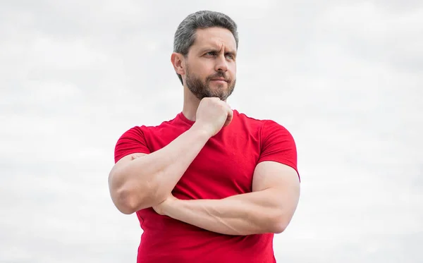 Thinking Man Red Shirt Outdoor Sky Background — Stockfoto