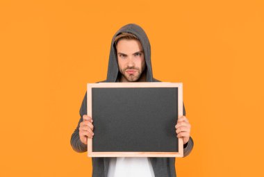 place for useful information. advertisement copy space. your marketing design. man hold blackboard. guy make announcement. male behind chalkboard.