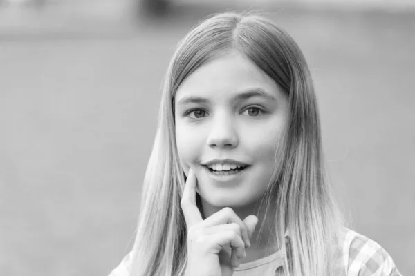 Portrait Happy Teenage Girl Smiling Finger Cheek Blurry Outdoors — Foto de Stock