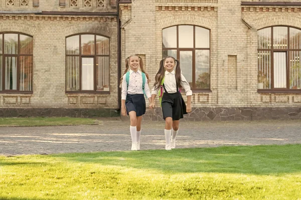 Two Teen Girls Uniform Walking Together Outdoor — Stockfoto