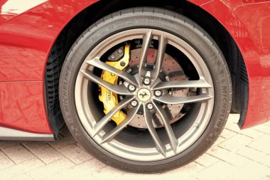 Miami Beach, Florida USA - April 18, 2021: ferrari car detail of wheel and tire.
