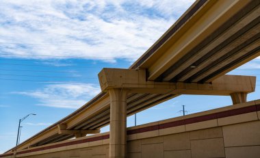 structural overpass in perspective. overpass structure of bridge. structural roadway. road junction. flyover architecture of transport system. bridge overpass on highway. Skyway bridge design. clipart