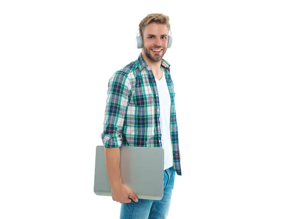 stock image positive millennial man student on background. millennial man student in studio. photo of millennial man student with laptop. millennial man student isolated on white.