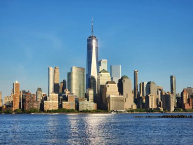 Kentsel mimari. Manhattan şehir merkezi. Metropolitan şehri. Büyük şehir manzarası. New York şehir merkezi. Manhattan silueti. New York şehri. Gündoğumunda New York 'un gökdelen şehri.