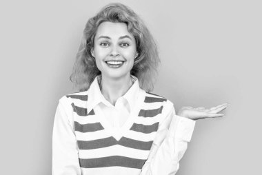 face of redhead woman presenting isolated on grey background. face of redhead woman in studio. face of redhead woman. photo face of redhead woman.