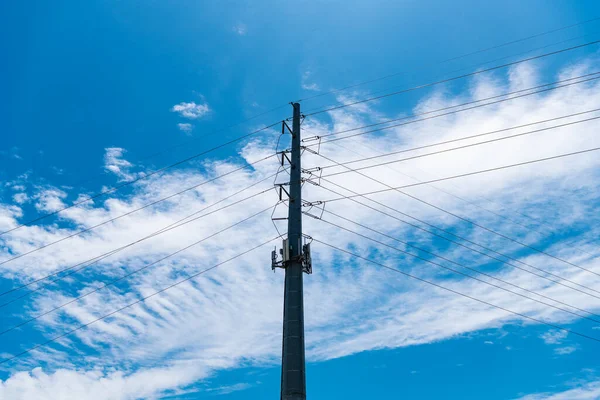 high voltage powerline. powerful substation. electricity provider. powering pylon utility. electricity power lines. pylon producing energy. voltage transmission on tower. Electricity consumption.