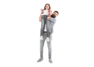 A darling daughter of her dad. Bearded man carrying small daughter child in his hands. Happy father and little daughter enjoying time together. Treating his daughter with love.