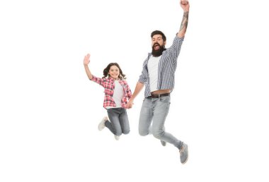 Showing a child love and care. Bearded man and small girl child smiling and holding hands. Happy father and little child daughter jumping with joy. Happy child and childhood.