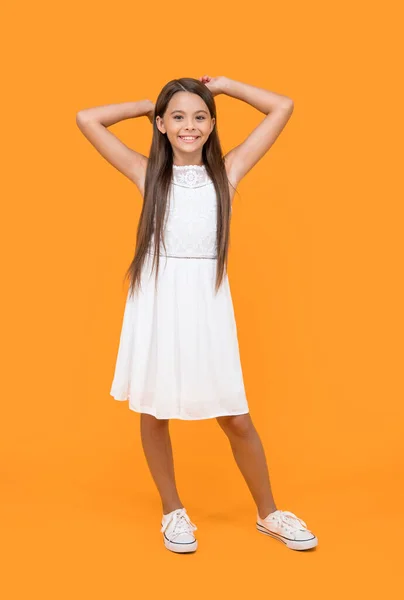 Cheerful Teen Child White Dress Standing Yellow Background — Stock Photo, Image