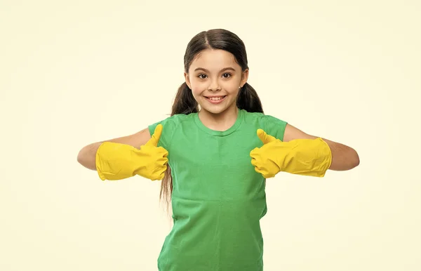 stock image girl cleaner housekeeping in studio, thumb up. girl cleaner housekeeping on background. photo of girl cleaner housekeeping. girl cleaner housekeeping isolated on white.