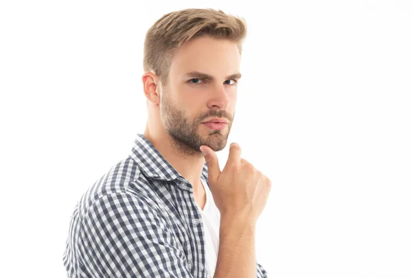 stock image caucasian unshaven man skincare. studio shot of unshaven man. young unshaven man isolated on white background. unshaven man in checkered shirt.