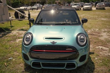 Miami Beach, Florida USA - April 15, 2021: blue Mini John Cooper Works JCW, front view.