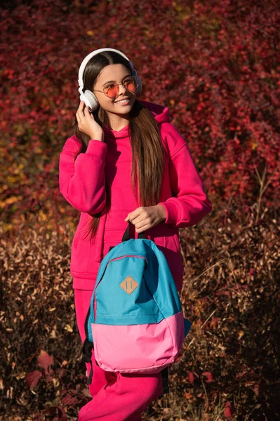 stock image education in autumn. school education for adolescent girl. gen z. girl in autumn park with backpack. autumn school girl ready to study. teen girl back to school. knowledge day. The new day.