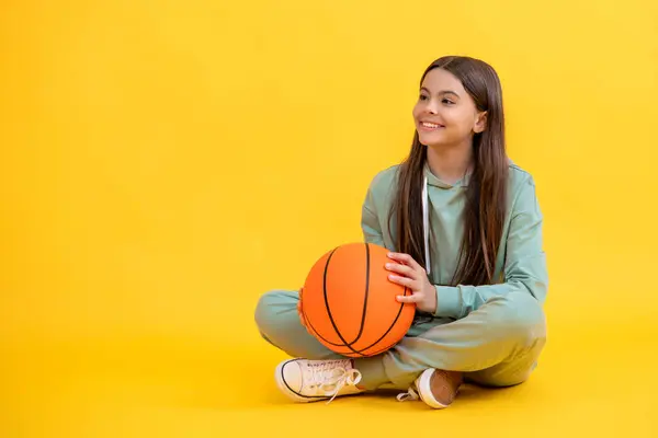 stock image Teen sport girl. Teen girl love the sport game of basketball. Teen girl excelling in basketball. teen girl basketball player. Passionate about basketball sport. Exciting childhood sports competitions.