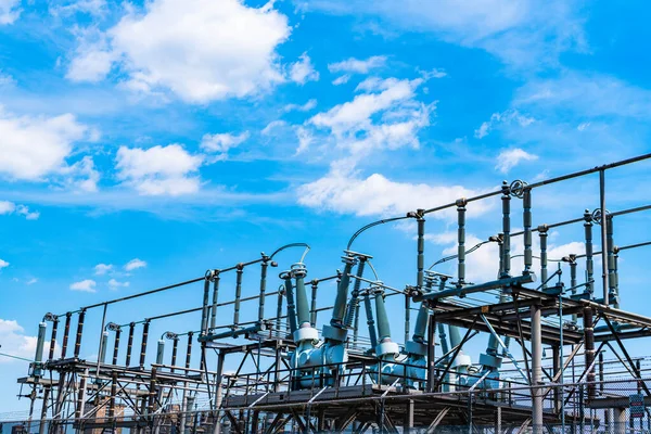 power transformer on voltage substation. electricity power line transformer. voltage substation or transmission. voltage substation with power line wire cable. transforming station.