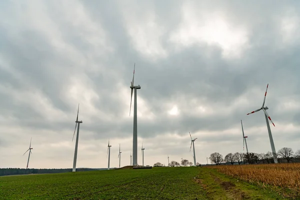 stock image windmill view. wind turbine generator for electricity. Green energy. Clean renewable energy. windmill turbines generating green energy. Windmills for power production. Windmill farm. wind turbines.