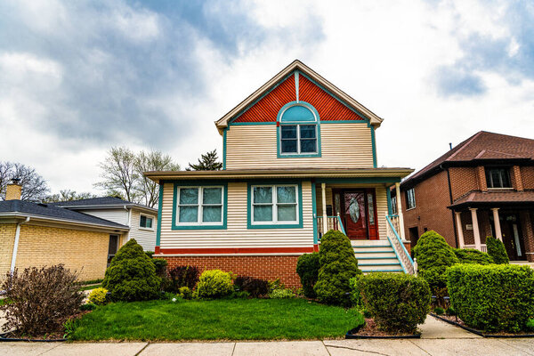 real estate. architectural house in suburban america. house apartment in suburb. suburban neighborhood. cottage house in american neighborhood. suburban house property. Suburban development.
