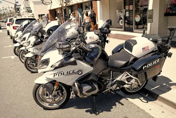 Stock image Long Beach, California USA - March 31, 2021: tustin police BMW R 1250 RT motorbikes. parked bikes.