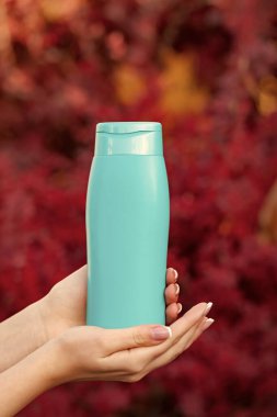 unbranded shower gel bottle with copy space.